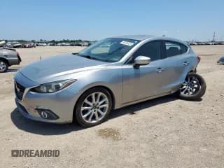 ✅ 2015 Mazda 3 S Touring • VIN: JM1BM1L36F1263413 • Lot: 66886425. Listed on Copart with 99,304 mi. Free auction sales archive from the USA and detailed vehicle history report at DreamBid. Image 1.