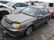 2005 Hyundai Accent GLS z VIN KMHCG45C55U617585, wystawiony jako Copart lot #47449285 z przebiegiem 141 635 mil mil oraz Szkoda całkowita • Salvage title. Historia ofert i sprzedaży dostępna na DreamBid. Obrazek 1.