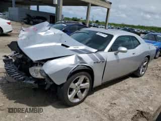 2009 Dodge Challenger R/T z VIN 2B3LJ54T09H509785, wystawiony jako Copart lot #66472714 z przebiegiem 86 756 mil mil oraz Szkoda całkowita • Salvage title. Historia ofert i sprzedaży dostępna na DreamBid. Obrazek 1.