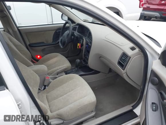 ✅ 2003 Hyundai Elantra GLS • VIN: KMHDN45DX3U594661 • Lot: 41492273. Wystawiony na IAAI z przebiegiem 146 302 mil. Bezpłatny archiwum sprzedaży aukcyjnych z USA i szczegółowy raport historii pojazdu na DreamBid. Zdjęcie 5.