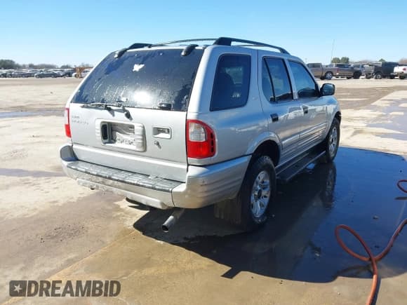 ✅ 2002 Isuzu Rodeo S • VIN: 4S2CK58WX24321556 • Lot: 41405981. Listed on IAAI with 172,590 mi. Free auction sales archive from the USA and detailed vehicle history report at DreamBid. Image 4.