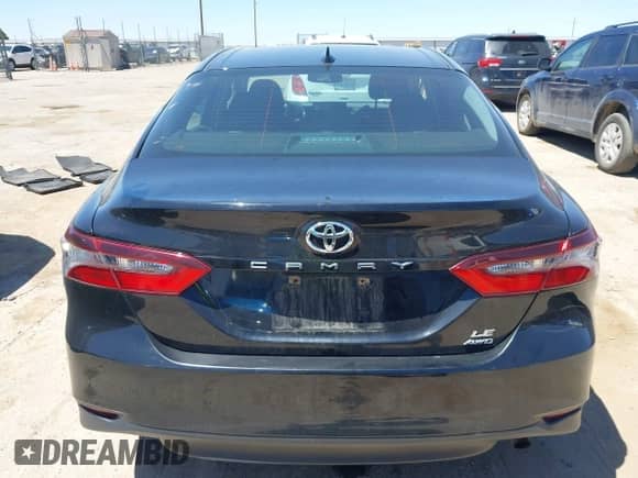2021 Toyota Camry LE z VIN 4T1R11BK5MU025785, wystawiony jako IAAI lot #42301558 z przebiegiem 47 494 mil mil oraz . Historia ofert i sprzedaży dostępna na DreamBid. Obrazek 16.