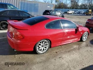 ✅ 2004 Pontiac GTO • VIN: 6G2VX12G24L312706 • Lot: 79524624. Listed on Copart with 59,781 mi. Free auction sales archive from the USA and detailed vehicle history report at DreamBid. Image 3.