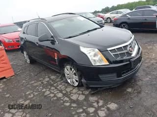 ✅ 2012 Cadillac SRX • VIN: 3GYFNGE31CS647084 • Lot: 42330237. Listed on IAAI with 127,294 mi. Free auction sales archive from the USA and detailed vehicle history report at DreamBid. Image 1.