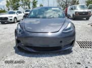 ✅ 2023 Tesla Model 3 • VIN: 5YJ3E1EA1PF407231 • Лот: 60969045. Опубликован ранее на Copart с пробегом 34 811 миль. Бесплатный доступ к архиву аукционных продаж из США и подробный отчёт об истории автомобиля на DreamBid. Изображение 5.