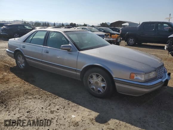 ✅ 1997 Cadillac Seville SLS • VIN: 1G6KS52Y0VU801906 • Lot: 65169364. Wystawiony na Copart z przebiegiem 191 627 mil. Bezpłatny archiwum sprzedaży aukcyjnych z USA i szczegółowy raport historii pojazdu na DreamBid. Zdjęcie 4.