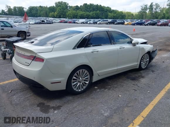 ✅ 2013 Lincoln MKZ • VIN: 3LN6L2G96DR805178 • Lot: 42915934. Wystawiony na IAAI z przebiegiem 158 757 mil. Bezpłatny archiwum sprzedaży aukcyjnych z USA i szczegółowy raport historii pojazdu na DreamBid. Zdjęcie 4.