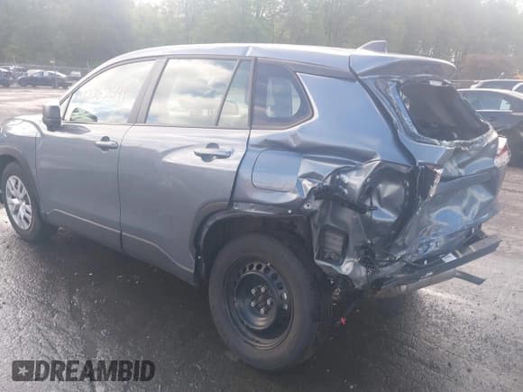 ✅ 2024 Toyota Corolla Cross L • VIN: 7MUAAABG4RV084390 • Lot: 42282541. Listed on IAAI with 31,799 mi. Free auction sales archive from the USA and detailed vehicle history report at DreamBid. Image 3.