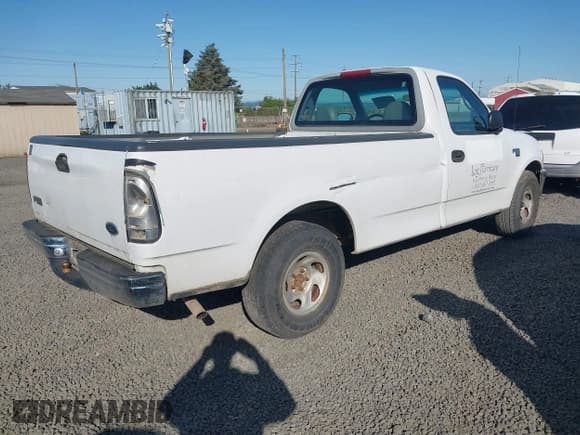✅ 1998 Ford F-150 • VIN: 2FTRF176XWCA94878 • Lot: 42128179. Listed on IAAI with 180,791 mi. Free auction sales archive from the USA and detailed vehicle history report at DreamBid. Image 4.