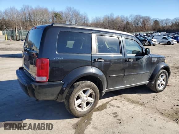 2009 Dodge Nitro SXT z VIN 1D8GU28K99W542939, wystawiony jako Copart lot #80309074 z przebiegiem 242 461 mil mil oraz Szkoda całkowita • Salvage title. Historia ofert i sprzedaży dostępna na DreamBid. Obrazek 3.