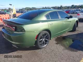 2022 Dodge Charger SXT with VIN 2C3CDXBG5NH202361, listed as a IAAI auction lot 43406992 with 34,449 mi miles and . Bid and sale history available at DreamBid. Image 4.
