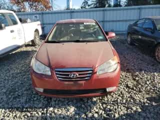 2010 Hyundai Elantra GLS z VIN KMHDU4AD4AU884593, wystawiony jako Copart lot #87119055 z przebiegiem 134 249 mil mil oraz Czysty tytuł • Clean title. Historia ofert i sprzedaży dostępna na DreamBid. Obrazek 5.