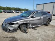✅ 2014 Ford Taurus SEL • VIN: 1FAHP2E80EG167679 • Лот: 75125764. Опубликован ранее на Copart с пробегом 186 502 миль. Бесплатный доступ к архиву аукционных продаж из США и подробный отчёт об истории автомобиля на DreamBid. Изображение 1.