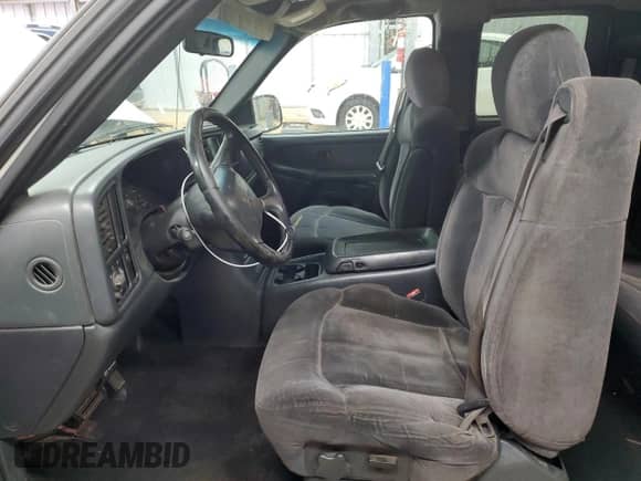 2002 Chevrolet Silverado 1500 with VIN 1GCEC19T72E234402, listed as a Copart auction lot 85130274 with 205,415 mi miles and Salvage title. Bid and sale history available at DreamBid. Image 7.