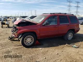 ✅ 2001 Jeep Grand Cherokee Limited • VIN: 1J4GW58NX1C701486 • Лот: 70835025. Опубликован ранее на Copart с пробегом 181 179 миль. Бесплатный доступ к архиву аукционных продаж из США и подробный отчёт об истории автомобиля на DreamBid. Изображение 1.