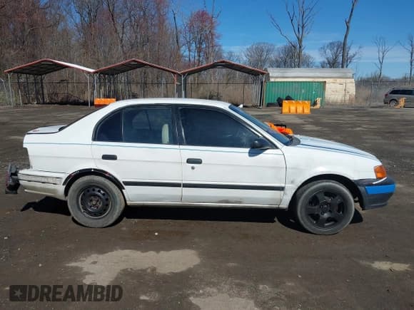 ✅ 1996 Toyota Tercel DX • VIN: JT2BC52L1T0174600 • Lot: 41858845. Wystawiony na IAAI z przebiegiem 197 630 mil. Bezpłatny archiwum sprzedaży aukcyjnych z USA i szczegółowy raport historii pojazdu na DreamBid. Zdjęcie 13.