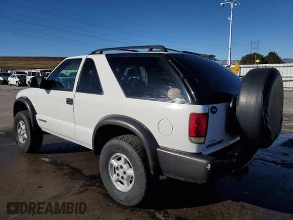 2005 Chevrolet Blazer LS с VIN 1GNCT18X65K106659, выставлен на аукционе Copart как лот 80054994 с пробегом 108 077 миль миль и Списание • Salvage title. История ставок и продаж доступна на DreamBid. Изображение 2.