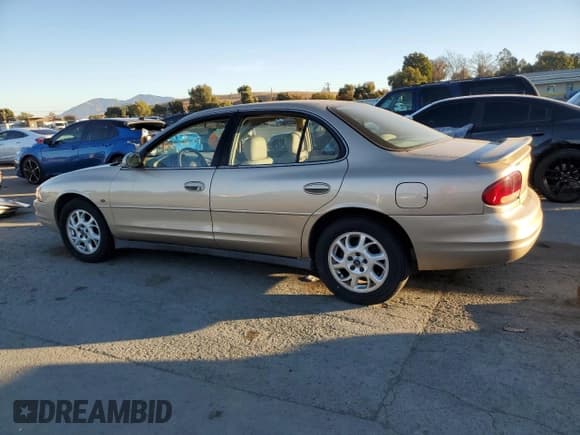 ✅ 2001 Oldsmobile Intrigue GL • VIN: 1G3WS52H71F183335 • Лот: 79344114. Опубликован ранее на Copart с пробегом 81 079 миль. Бесплатный доступ к архиву аукционных продаж из США и подробный отчёт об истории автомобиля на DreamBid. Изображение 2.