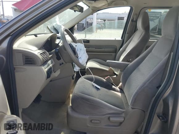 ✅ 2005 Ford Freestar SE • VIN: 2FMDA51635BA60614 • Lot: 60058044. Wystawiony na Copart z przebiegiem 228 858 mil. Bezpłatny archiwum sprzedaży aukcyjnych z USA i szczegółowy raport historii pojazdu na DreamBid. Zdjęcie 7.