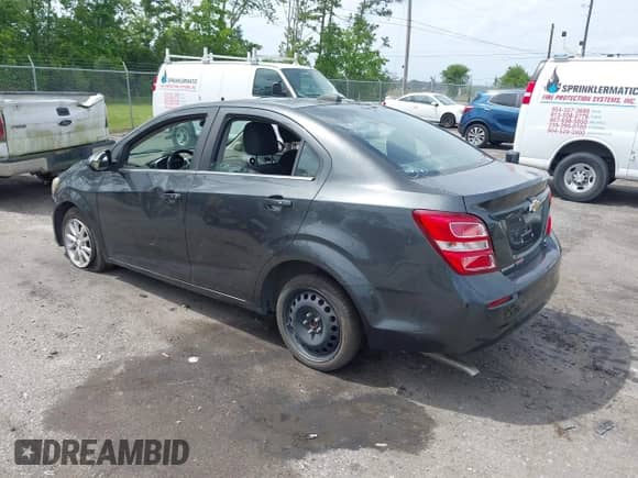 2017 Chevrolet Sonic LT with VIN 1G1JD5SBXH4102715, listed as a IAAI auction lot 42095143 with 109,659 mi miles and . Bid and sale history available at DreamBid. Image 3.