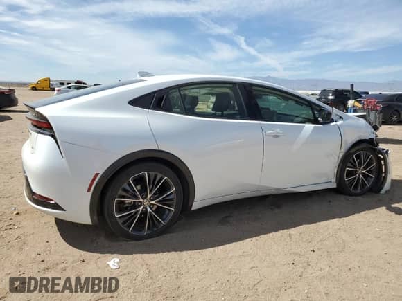 2024 Toyota Prius LE with VIN JTDACAAUXR3030010, listed as a Copart auction lot 69868615 with 22,790 mi miles and Salvage title. Bid and sale history available at DreamBid. Image 3.