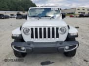 ✅ 2022 Jeep Wrangler Unlimited Sahara Altitude • VIN: 1C4HJXEG3NW148744 • Lot: 70289415. Listed on Copart with 21,630 mi. Free auction sales archive from the USA and detailed vehicle history report at DreamBid. Image 5.