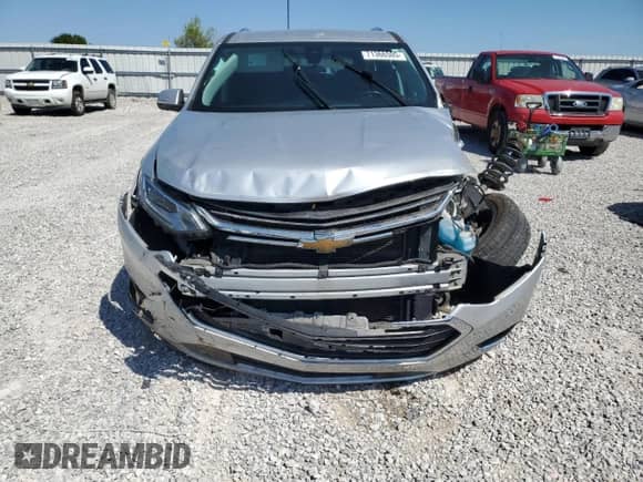 2021 Chevrolet Traverse Premier с VIN 1GNEVKKW3MJ162698, выставлен на аукционе Copart как лот 71366505 с пробегом 85 520 миль миль и Списание • Salvage title. История ставок и продаж доступна на DreamBid. Изображение 5.
