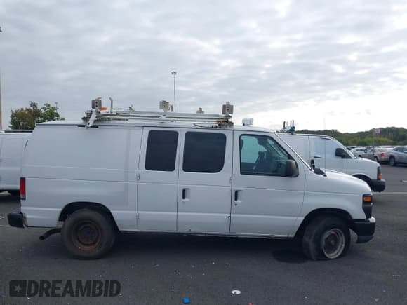 ✅ 2011 Ford Econoline Cargo Commercial • VIN: 1FTNE2EL1BDB35067 • Лот: 43218442. Опубликован ранее на IAAI с пробегом 138 149 миль. Бесплатный доступ к архиву аукционных продаж из США и подробный отчёт об истории автомобиля на DreamBid. Изображение 13.