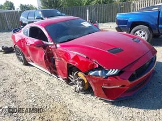 ✅ 2022 Ford Mustang GT • VIN: 1FA6P8CF8N5135411 • Lot: 43071297. Listed on IAAI with 10,720 mi. Free auction sales archive from the USA and detailed vehicle history report at DreamBid. Image 1.