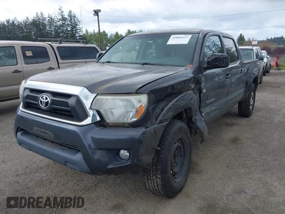 ✅ 2012 Toyota Tacoma PreRunner • VIN: 3TMKU4HN4CM033430 • Lot: 42085127. Listed on IAAI with 138,794 mi. Free auction sales archive from the USA and detailed vehicle history report at DreamBid. Image 2.