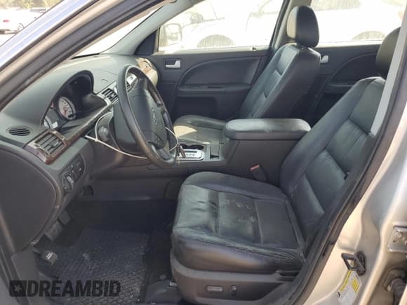 ✅ 2007 Ford Five Hundred Limited • VIN: 1FAFP25187G113818 • Lot: 74110814. Wystawiony na Copart z przebiegiem Nie podano. Bezpłatny archiwum sprzedaży aukcyjnych z USA i szczegółowy raport historii pojazdu na DreamBid. Zdjęcie 7.