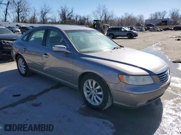 2007 Hyundai Azera SE with VIN KMHFC46F17A183591, listed as a Copart auction lot 46900375 with 144,664 mi miles and Salvage title. Bid and sale history available at DreamBid. Image 4.