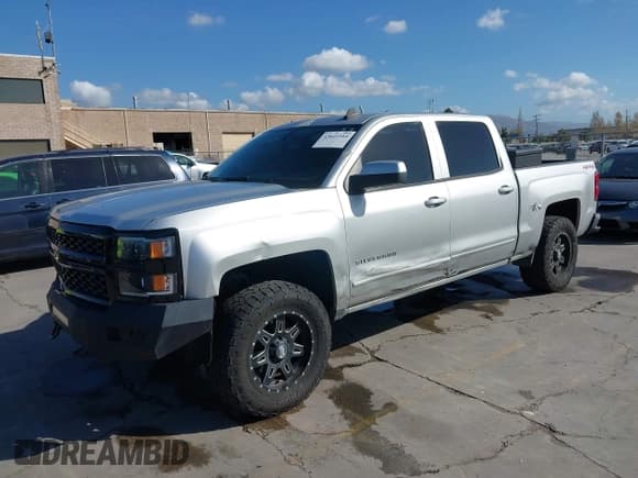 ✅ 2015 Chevrolet Silverado 1500 LT • VIN: 3GCUKREC9FG112206 • Lot: 43641164. Listed on IAAI with 132,928 mi. Free auction sales archive from the USA and detailed vehicle history report at DreamBid. Image 2.