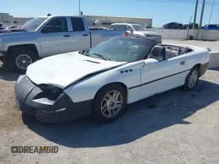 1995 Chevrolet Camaro z VIN 2G1FP32S5S2212988, wystawiony jako IAAI lot #41796497 z przebiegiem 164 711 mil mil oraz . Historia ofert i sprzedaży dostępna na DreamBid. Obrazek 2.