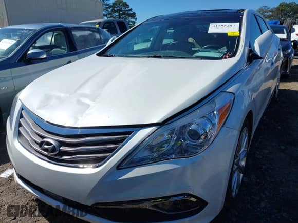 2016 Hyundai Azera Limited with VIN KMHFH4JG0GA508622, listed as a IAAI auction lot 41598287 with 69,013 mi miles and . Bid and sale history available at DreamBid. Image 12.