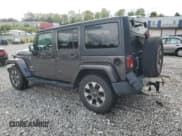✅ 2014 Jeep Wrangler Unlimited Sahara • VIN: 1C4BJWEG0EL258765 • Lot: 84206115. Wystawiony na Copart z przebiegiem 143 903 mil. Bezpłatny archiwum sprzedaży aukcyjnych z USA i szczegółowy raport historii pojazdu na DreamBid. Zdjęcie 2.