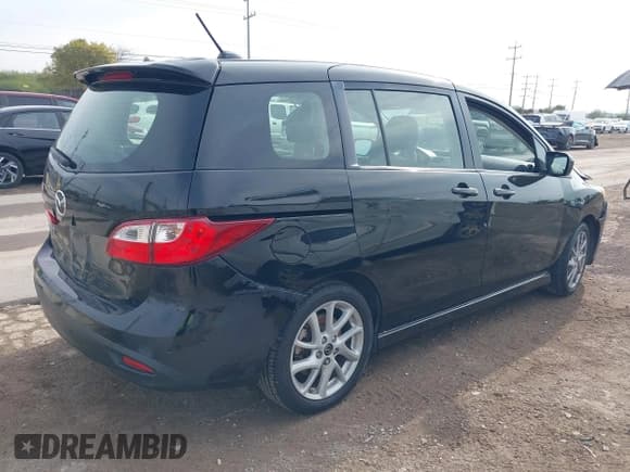 ✅ 2012 Mazda 5 Grand Touring • VIN: JM1CW2DL5C0139864 • Lot: 43851174. Listed on IAAI with 145,103 mi. Free auction sales archive from the USA and detailed vehicle history report at DreamBid. Image 4.