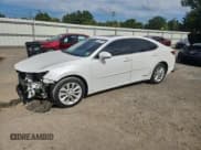 ✅ 2014 Lexus ES 300h • VIN: JTHBW1GG6E2039461 • Lot: 84951595. Listed on Copart with 157,924 mi. Free auction sales archive from the USA and detailed vehicle history report at DreamBid. Image 1.