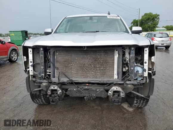 2015 Chevrolet Silverado 1500 LT с VIN 3GCUKREC4FG518765, выставлен на аукционе Copart как лот 62302585 с пробегом 165 465 миль миль и Списание • Salvage title. История ставок и продаж доступна на DreamBid. Изображение 5.