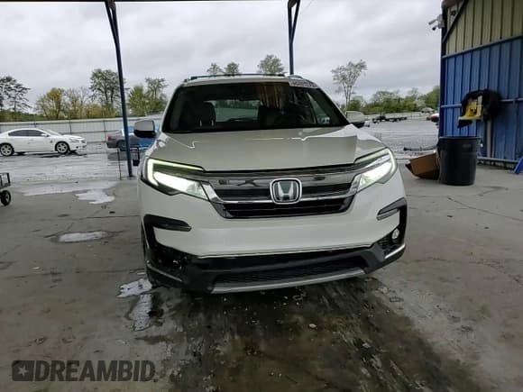 ✅ 2019 Honda Pilot Touring 8-Passenger • VIN: 5FNYF5H98KB033740 • Lot: 90401525. Listed on Copart with 91,251 mi. Free auction sales archive from the USA and detailed vehicle history report at DreamBid. Image 14.