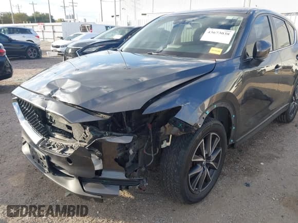 ✅ 2018 Mazda CX-5 Touring • VIN: JM3KFACM8J0375736 • Lot: 43673038. Wystawiony na IAAI z przebiegiem 111 478 mil. Bezpłatny archiwum sprzedaży aukcyjnych z USA i szczegółowy raport historii pojazdu na DreamBid. Zdjęcie 6.