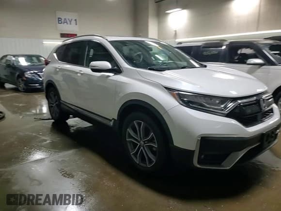 ✅ 2021 Honda CR-V Touring • VIN: 2HKRW2H97MH649971 • Lot: 93375235. Listed on Copart with 100,965 mi. Free auction sales archive from the USA and detailed vehicle history report at DreamBid. Image 13.
