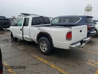 ✅ 2003 Dodge Dakota SLT • VIN: 1D7HL42X33S151165 • Lot: 78040874. Wystawiony na Copart z przebiegiem 84 766 mil. Bezpłatny archiwum sprzedaży aukcyjnych z USA i szczegółowy raport historii pojazdu na DreamBid. Zdjęcie 2.