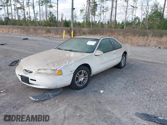 ✅ 1996 Ford Thunderbird LX • VIN: 1FALP62W4TH154400 • Лот: 41394723. Опубликован ранее на IAAI с пробегом 65 860 миль. Бесплатный доступ к архиву аукционных продаж из США и подробный отчёт об истории автомобиля на DreamBid. Изображение 2.