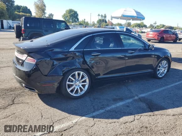 ✅ 2016 Lincoln MKZ Hybrid • VIN: 3LN6L2LU3GR612954 • Lot: 81960535. Listed on Copart with 79,234 mi. Free auction sales archive from the USA and detailed vehicle history report at DreamBid. Image 3.