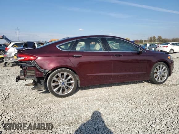 ✅ 2017 Ford Fusion Titanium • VIN: 3FA6P0K95HR371948 • Lot: 90916325. Listed on Copart with 125,828 mi. Free auction sales archive from the USA and detailed vehicle history report at DreamBid. Image 3.