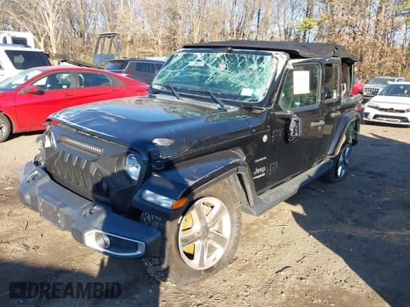 ✅ 2021 Jeep Wrangler Unlimited Sahara • VIN: 1C4HJXEN4MW714133 • Lot: 41241040. Listed on IAAI with 82,247 mi. Free auction sales archive from the USA and detailed vehicle history report at DreamBid. Image 2.