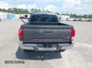 ✅ 2017 Toyota Tacoma SR5 • VIN: 5TFAZ5CN5HX049602 • Лот: 43070186. Опубликован ранее на IAAI с пробегом 119 102 миль. Бесплатный доступ к архиву аукционных продаж из США и подробный отчёт об истории автомобиля на DreamBid. Изображение 16.