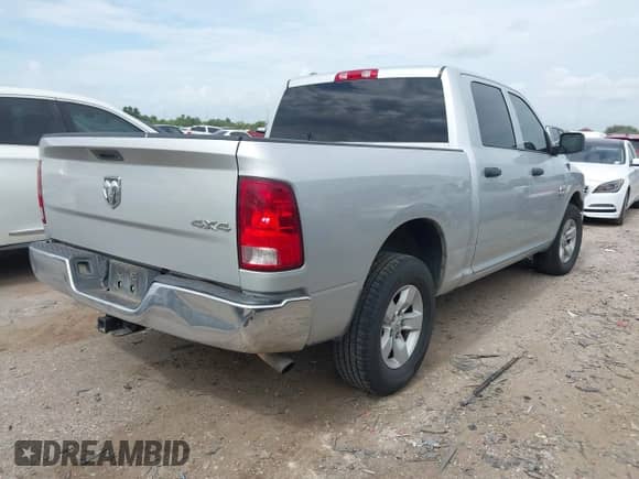 2014 Ram 1500 Tradesman with VIN 1C6RR7KG9ES283324, listed as a IAAI auction lot 42657876 with 210,486 mi miles and . Bid and sale history available at DreamBid. Image 4.