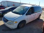 ✅ 1999 Chrysler Town & Country LX • VIN: 1C4GP54L0XB898500 • Lot: 43650504. Listed on IAAI with 305,025 mi. Free auction sales archive from the USA and detailed vehicle history report at DreamBid. Image 17.